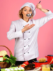 Female chef in white uniform with ladle spoon. Cooking and professional culinary. Food preparation.