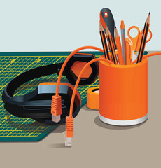 A table with a cutting mat, headphones, a plastic cup with stationery. Vector illustration