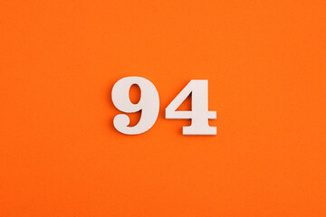 Number 94 - On orange foam rubber background