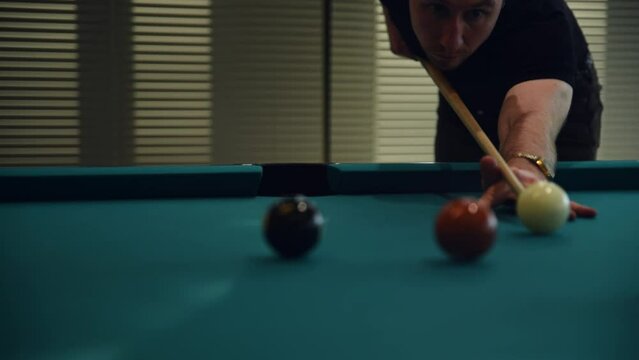 Snooker player kicks the ball in pool billiard table with good and bad shots. Competition concept of different sports leisure activities games.