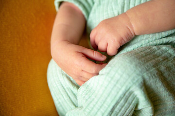 close-up of the handles of a small newborn baby.