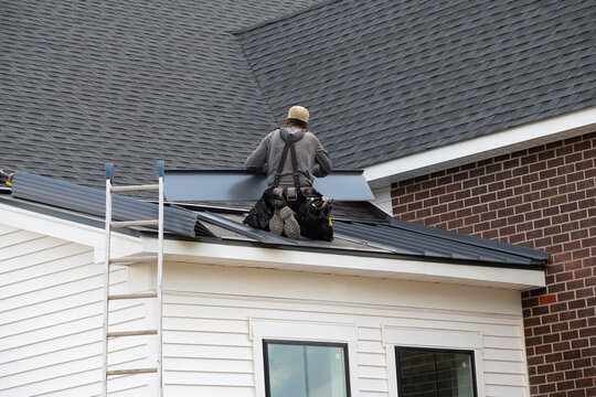 worker making iron roof