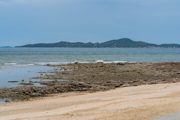 Stones lying on the seashore at low tide.