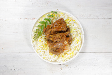 Beef ribs biryani Spicy Indian Malabar biryani Hyderabadi biryani, Dum Biriyani pulao clay pot Kerala India Sri Lanka Pakistan basmati rice mixed rice dish meat curry Ramadan Kareem.