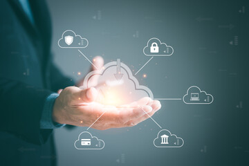 cloud technology icon in the hands of business people Used to connect data and communication networks on a secure storage area, a security infrastructure concept that backs up online databases.
