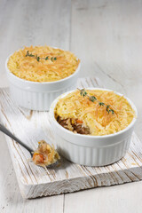 Pastel Tutup (Shepherd's Pie) is Traditional British pie. It is made from mashed potato, minced beef, mushroom, spices and herbs.