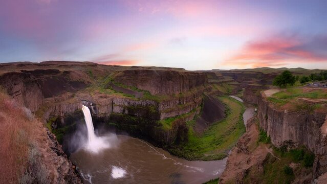 Cinemagraph Continuous Loop. Waterfall in the American Mountain Landscape. Sunset Sky Art Render. Palouse Falls State Park, Washington, United States of America. Nature Background Panorama
