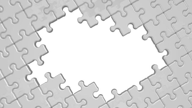 Assembling and disassembling puzzle. Assembling and disassembling puzzle elements on white background. Cycle, seamless video. Footage video