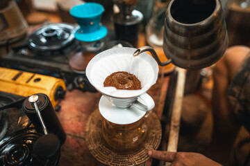 Closeup of hands barista make coffee