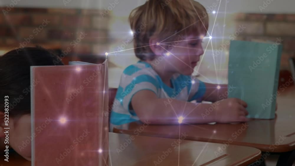 Poster animation of glowing network of connections over diverse students studying in the class at school