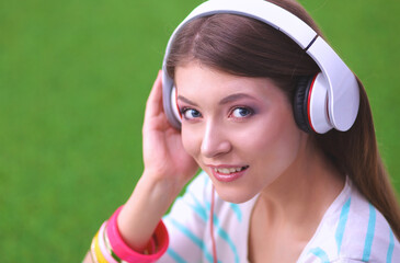 Young woman listening to the music