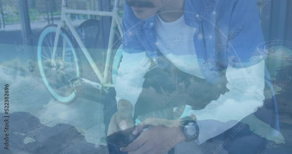 Poster animation of network of connections over clouds against caucasian man using smartphone on the street