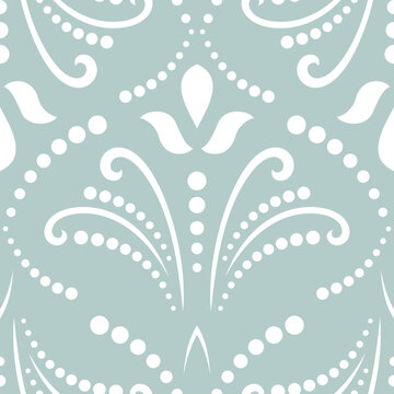Floral vector light blue and white ornament. Seamless abstract classic background with white flowers. Pattern with repeating floral elements. Ornament for wallpaper and packaging