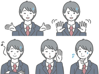 とぼけるスーツの若い男性