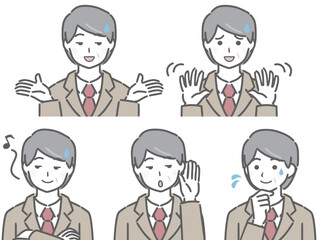 とぼけるスーツの中年男性