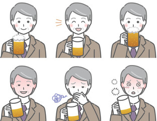 お酒を飲むスーツの高齢男性