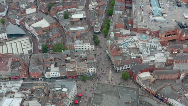 Circling drone shot around Leicester central square and clock tower