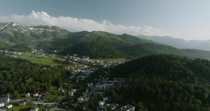Idyllic Ski Resort Town With Forested Caucasus Mountain Ranges In Bakuriani, Borjomi District of Georgia. Aerial Wide Shot