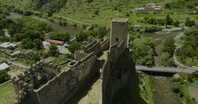 Flying Over The Khertvisi Fortress On The Hilltop Between The Paravani And Mtkvari Rivers In Georgia. - aerial pullback