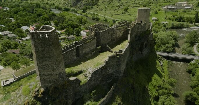 Old Khertvisi Fortress Settled In A Tall And Rocky Mountain Of Aspindza Municipality, Southern Georgia. Forward-Drone Shot