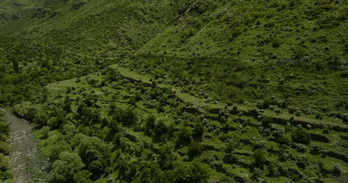 Rugged Mountainside Of The Old Farming Terraces In Southern Georgia Along Paravani River, Near Khertvisi Fortress. Aerial 