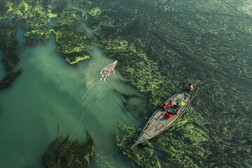 Fishermen are seen floating on top of algae as they search for potential catch in the sharp green...