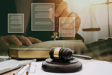 Business and lawyers discussing contract papers with brass scale on desk in office. Law, legal...