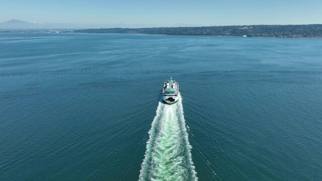 Aerial shot pulling away from a Washington State ferry.