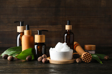 Concept of skin care cosmetics on wooden table, Shea butter