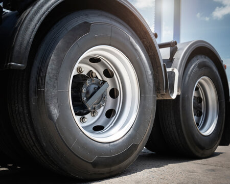 Big Semi Truck Wheels Tires. Rubber, Wheel Tyres. Freight Trucks Transport Logistics. Auto Service Shop. 	