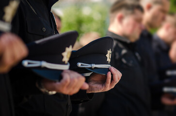 Uniform cap in the hand of Ukrainian policmen	