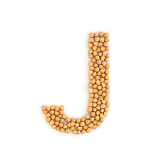 Capital letter J made from chickpea beans. Dry chick pea font. Alphabet made from gram . White background