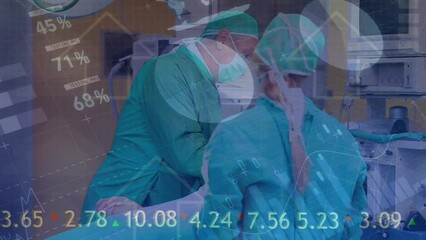 Animation of medical data processing over caucasian surgeons operating patient in hospital - Powered by Adobe