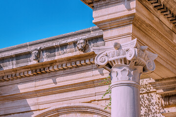 Close-up details of a famous gate or Hadrian's Arch in Antalya. Travel landmarks and restoration of heritage site in Turkey.