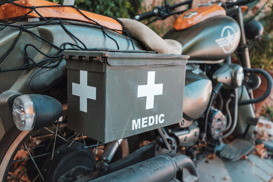 Medic motorcycle with the emblem of the American army. The concept of injury and rescue of people in military conflicts around the world.