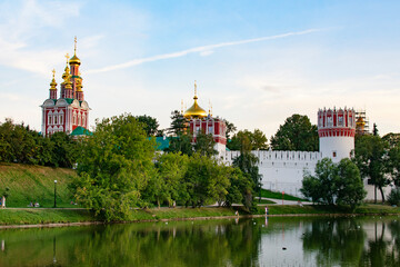 Fototapeta na wymiar Novodevichy Monastery. The Gate Church and the wall of the Novodevichy Convent.