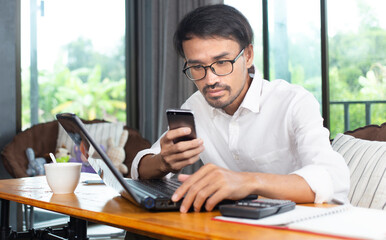 young man or student using mobile phone  and learning online and job	
