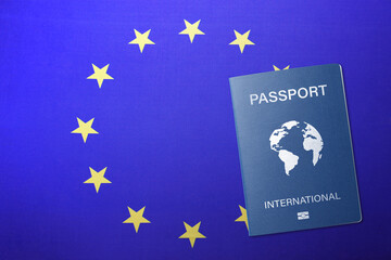 International passport on flag of European Union, top view