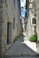 Fototapeta na wymiar A narrow street in Cusano Mutri, a medieval village in the province of Benevento in Campania, Italy. 
