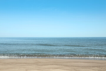 Picturesque view of sandy beach near sea