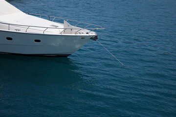 Beautiful sea with white boat on sunny day. Space for text