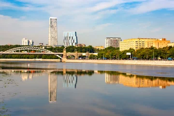 Foto op Canvas Moscow, Russia - August 3, 2022: View of the buildings of the city of moscow from the savvinskaya embankment and the moskva river. © Alena