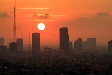 Fototapeta na wymiar Beautiful sunset views in the city of Jakarta, Indonesia, with buildings as the foreground