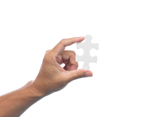 Hand with jigsaw puzzle isolated