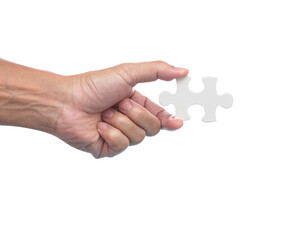 Hand with jigsaw puzzle isolated