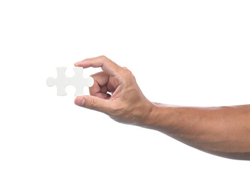 Hand with jigsaw puzzle isolated - obrazy, fototapety, plakaty