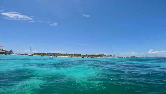 4k footage of leisure craft moored off Playa Norte on Isla Mujeres, Mexico