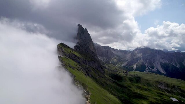 Seceda in dolomites in clouds