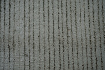 reinforced concrete road surface (scratches make the skin rough)