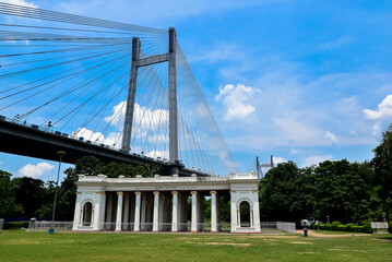 KOLKATA, INDIA - July 30, 2022: 2nd Hooghly Bridge (Vidyasagar Setu) as seen from Princep Memorial (Ghat), a notable architectural landmark in the city of Kolkata.